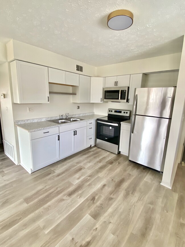 Brand new kitchen in your new home - 145 E Wellington Ave