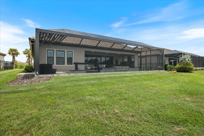Building Photo - Luxury Home w/ Pool, Outdoor Kitchen, Car Lift, & Water View In Parrish!