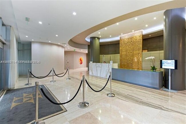 Building Photo - 10275 Collins Ave
