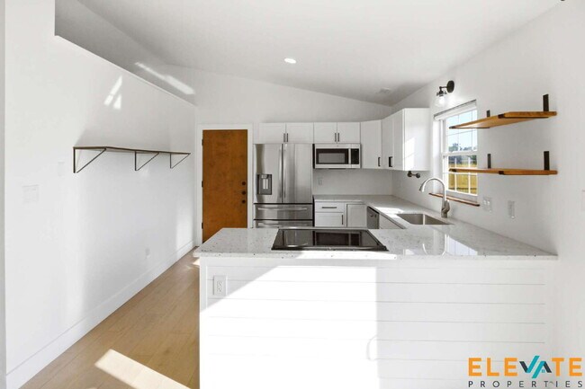 Building Photo - Beautiful Like-New 3 Bedroom Home with Huge Fenced Yard, Greenhouse & Storage