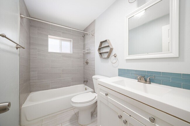 Building Photo - Spacious 3-Bedroom Upgraded Attached Home ...