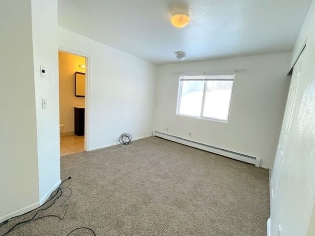 Building Photo - RARE FIND! Spacious and bright three bedro...