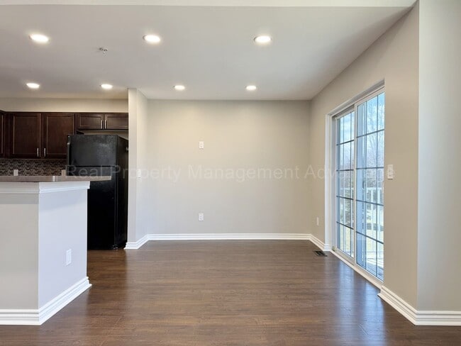 Building Photo - Rare Corner Upper Condo with Vaulted Ceilings, Private Balcony and 2 Car Garage - Right Across fr...