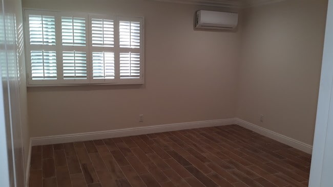 New bedroom window, Plantation shutters, Bos - 4727 W 147th St