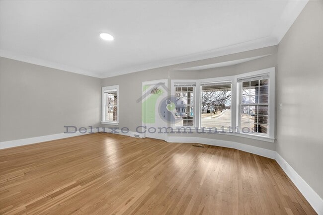 Building Photo - Spacious 4 Bedroom- With Extra room! New Remodel!