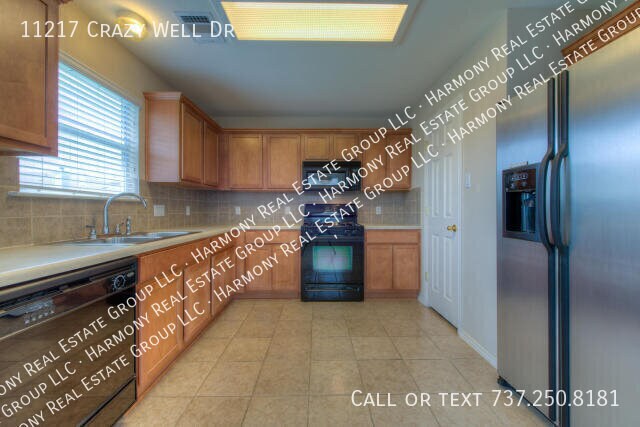 Building Photo - 11217 Crazy Well Dr