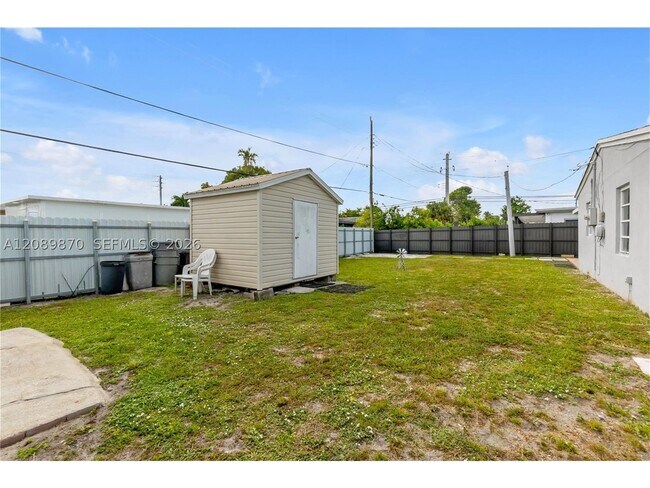 Building Photo - 6049 W 14th Ln