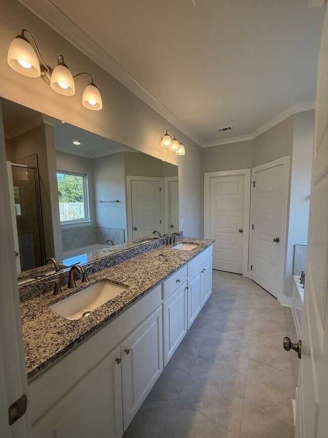 Building Photo - Must See! New 4/2 Home off Tiger Bend Rd. in Garden Hill Subdivision