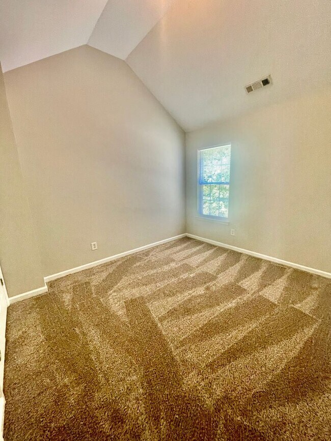Building Photo - Come take a look at the gorgeous newly renovated 4 bedroom, 2.5 bath, 2 car garage home located i...