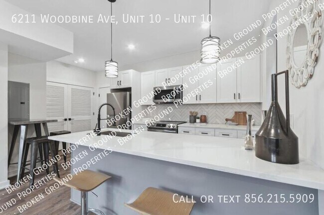 Building Photo - 6211 Woodbine Ave