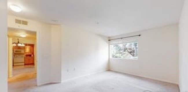 Building Photo - Cozy Two Bed/Two Bath Condo in Convenient ...
