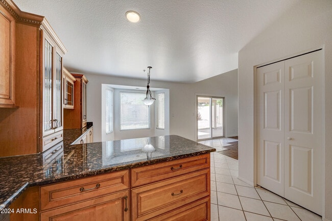 Building Photo - 8804 E Charter Oak Dr