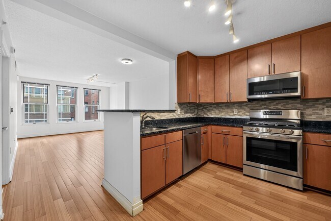 Building Photo - Penn Quarter 1BR Condo with Balcony, Garage Parking, Storage, Concierge, and Rooftop Deck.