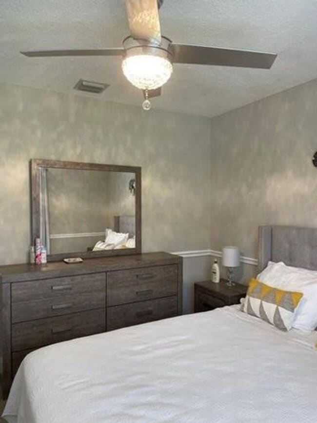 Building Photo - 7891 Manor Forest Blvd