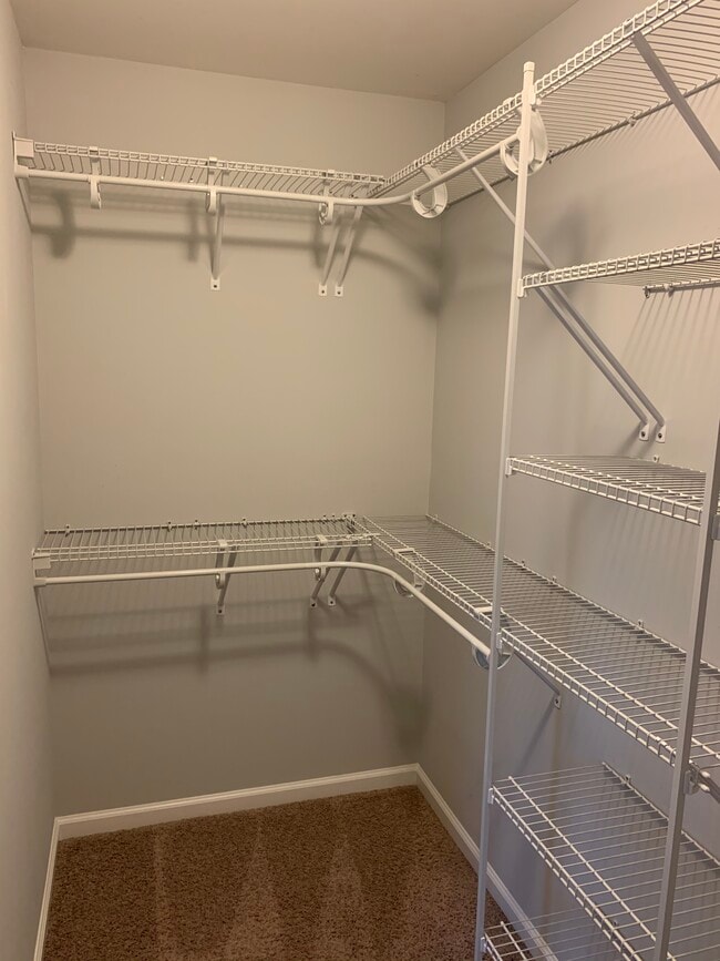 Master closet with shelving system - 1545 Oldenburg Dr
