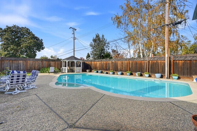 Building Photo - One-of-a-Kind Home with Pool, Gazebo, and Sunken Conversation Pit!