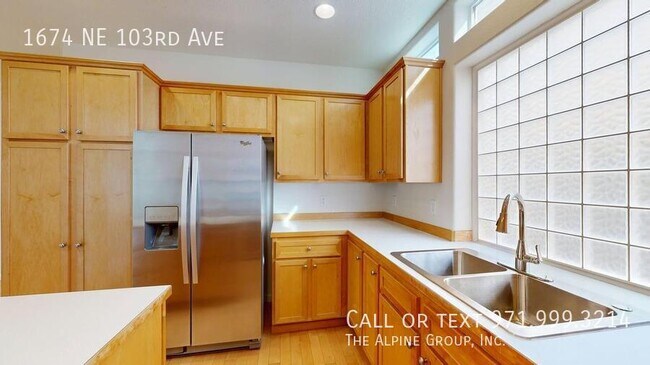 Building Photo - 1674 NE 103rd Ave