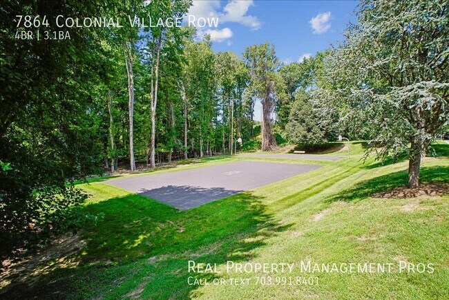 Building Photo - 7864 Colonial Village Row