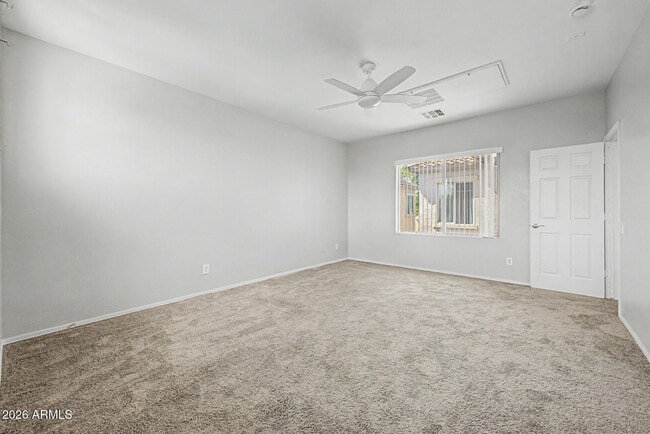 Building Photo - 9442 W Palm Ln