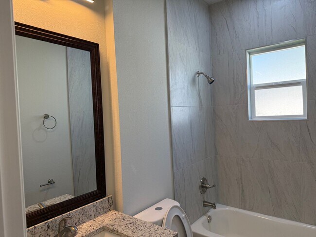 Building Photo - Brand New 3 Bedroom, 2 Bathroom Townhome with 1-Car Garage, Screened Porch & FULLY PRIVATE Fenced...