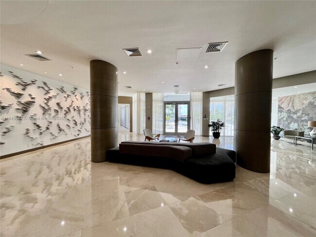 Building Photo - 10275 Collins Ave