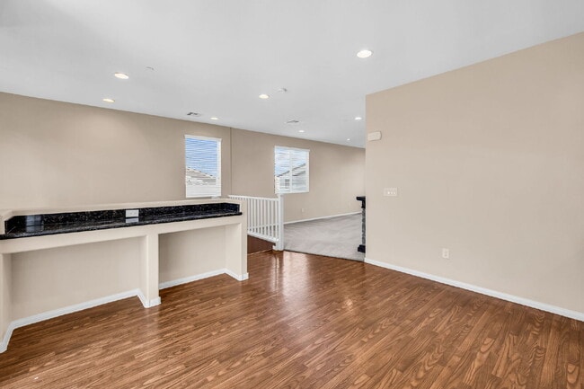 Building Photo - Modern, Guard Gated, and Close to Everything! 3-Bed Townhome Near St. Rose Parkway and Liberty Hi...