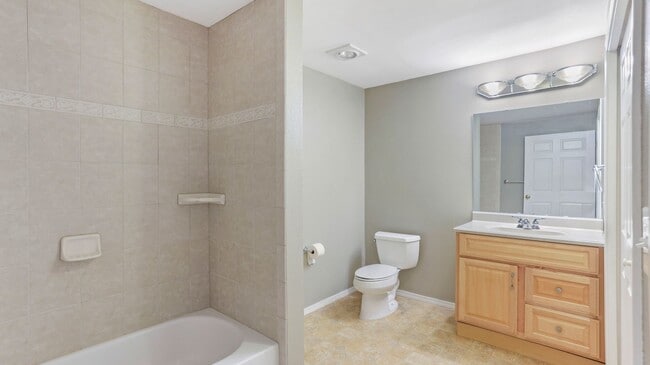 Building Photo - This ground floor corner-unit condo