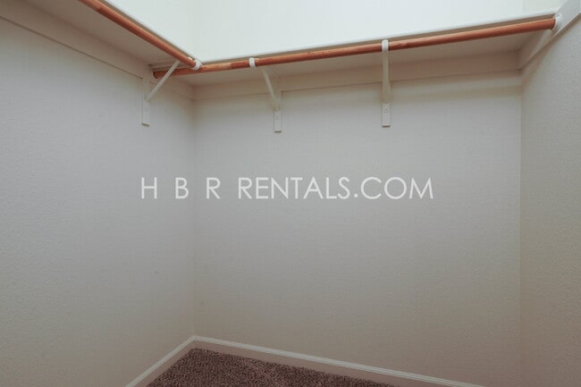 Building Photo - Questa Village: Spacious 3-Bedroom Retreat...