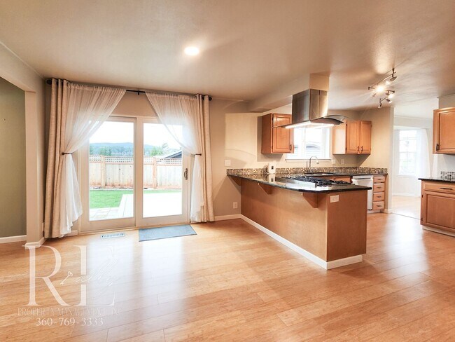 Building Photo - Modern Elegance Meets Tranquil Lakeside Living On Osprey Circle