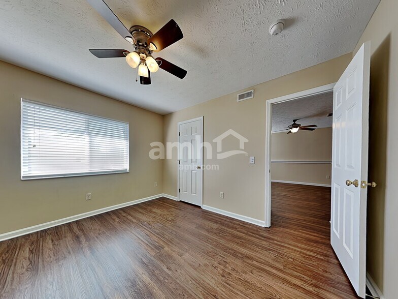 Building Photo - 9937 Whispering Pine Dr