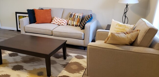 Building Photo - Settle in and cozy up in this comfortable lower-level two-bedroom apartment.