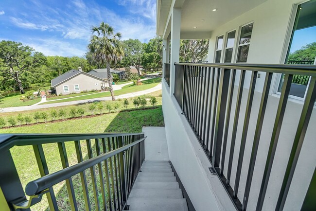 Building Photo - Stunning 4/3 in Gated Dora Parc! Water Views!