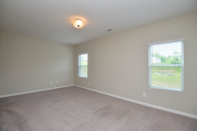 Building Photo - Spacious 4 Bedroom Home with 1st Floor Primary Suite in Austen Lakes  4 Bedrooms | 2.5 Bathrooms ...
