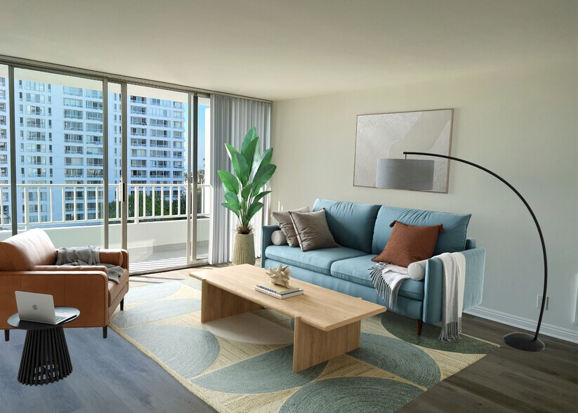 Living room leads to balcony for ocean views - The Shores