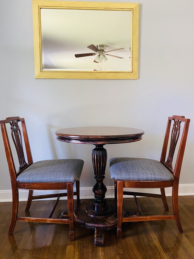 Small game table in the living room. - 1101 Brookwood Cir