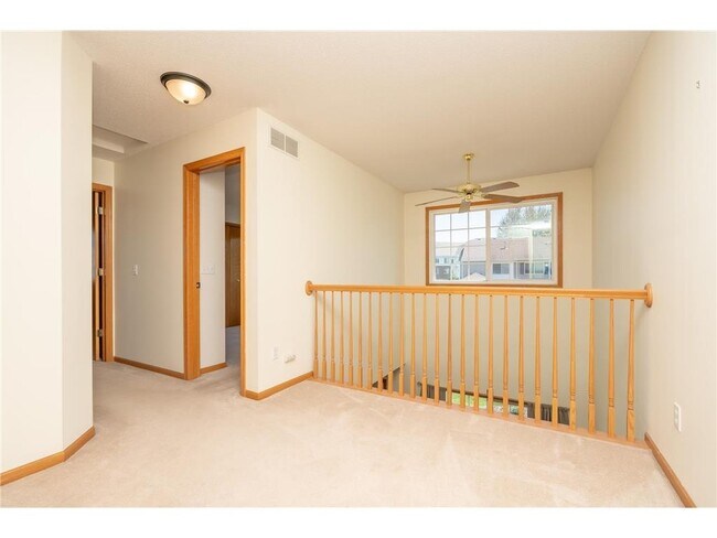 Building Photo - 9277 Inland Ln N
