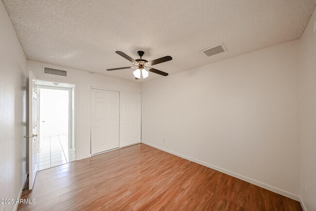 Building Photo - 3408 W Port Au Prince Ln