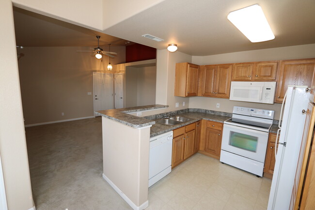 Building Photo - Upper level 2 bedroom condo near Peterson AFB