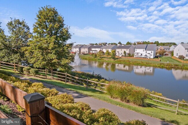 Building Photo - Spacious 4-Bedroom Home with Lake Views & Finished Basement