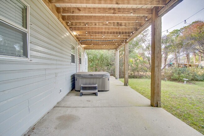 Building Photo - Live the Gulf Breeze Waterfront Life – Dock, Canal Access & Boat Lift!