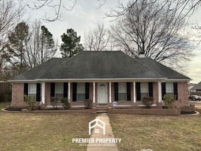 Building Photo - Spacious 3BR/2.5BA Olive Branch Home w/ Vaulted Ceilings, Fireplace, Formal Dining & Fenced Yard