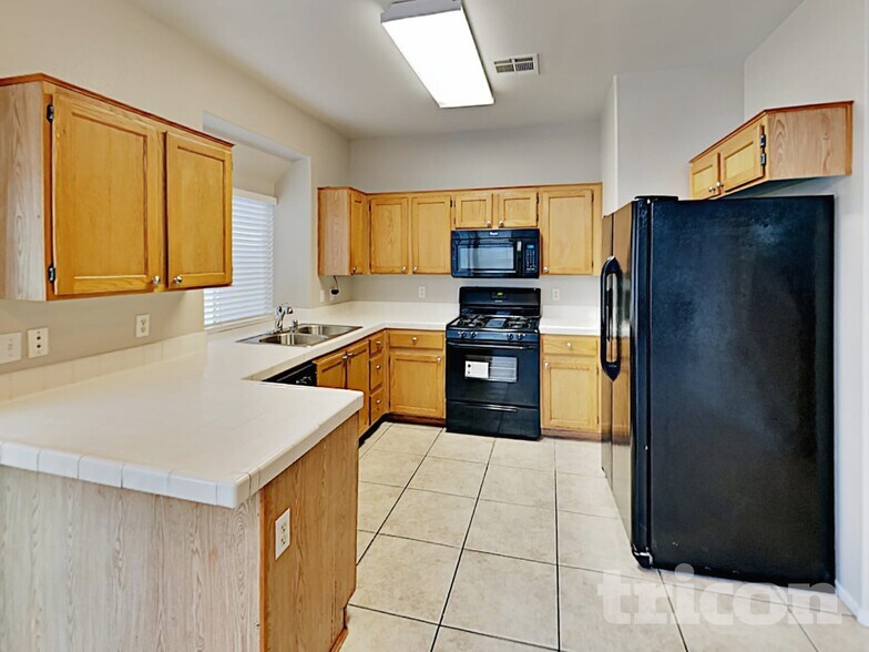 Building Photo - 6667 Whistling Swan Way