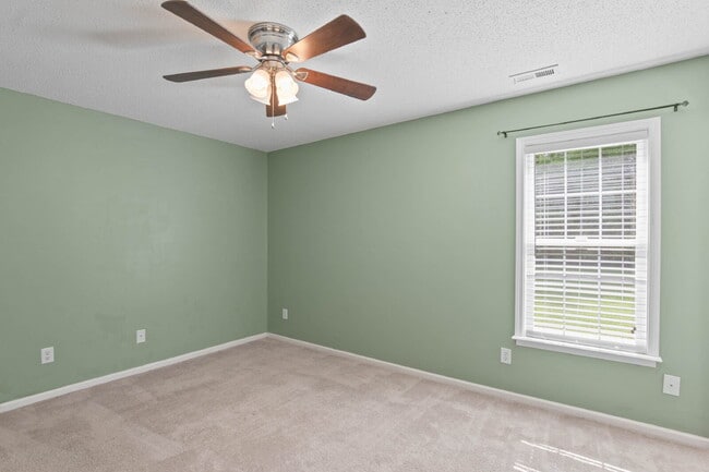 Building Photo - "Charming 3-Bedroom Sanctuary with 2 Full ...