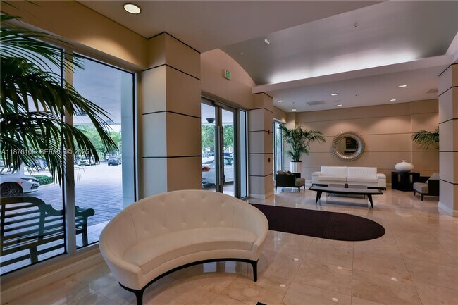 Building Photo - 19380 Collins Ave