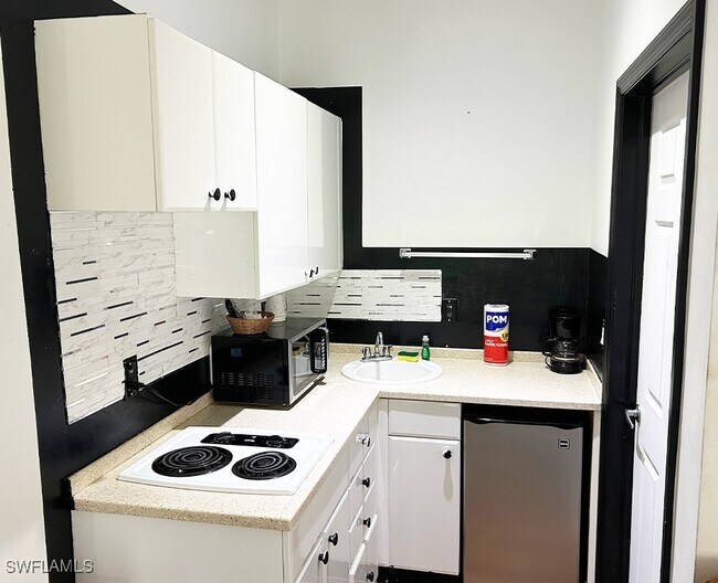 Building Photo - 25000 Tamiami Trl E