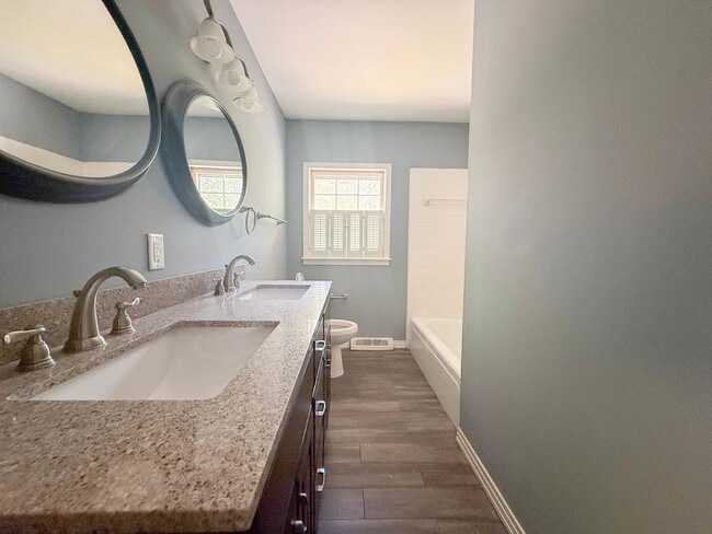 Building Photo - Updated 3-Bedroom with Bonus Room, Deck & Screened-In Porch