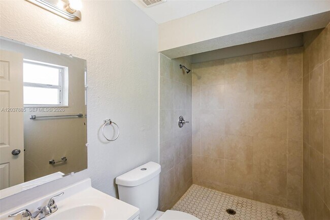 Building Photo - 5980 NW 24th Ct