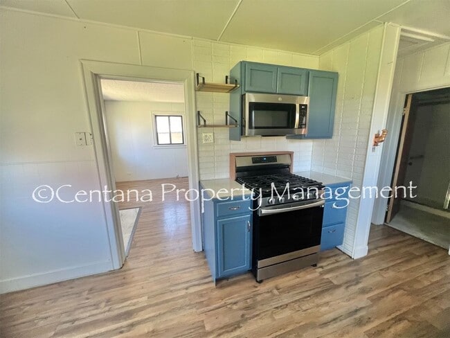Building Photo - Remodeled 2 bedroom house on the flats with a garage, fenced yard, storage, and so much more!