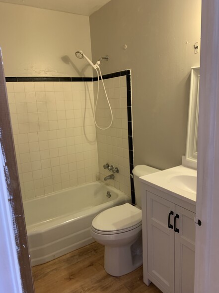 Bathroom with new vanity and toilet - 896 Raymond Dr