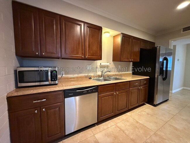 Building Photo - 12076 N Pebble Beach Dr